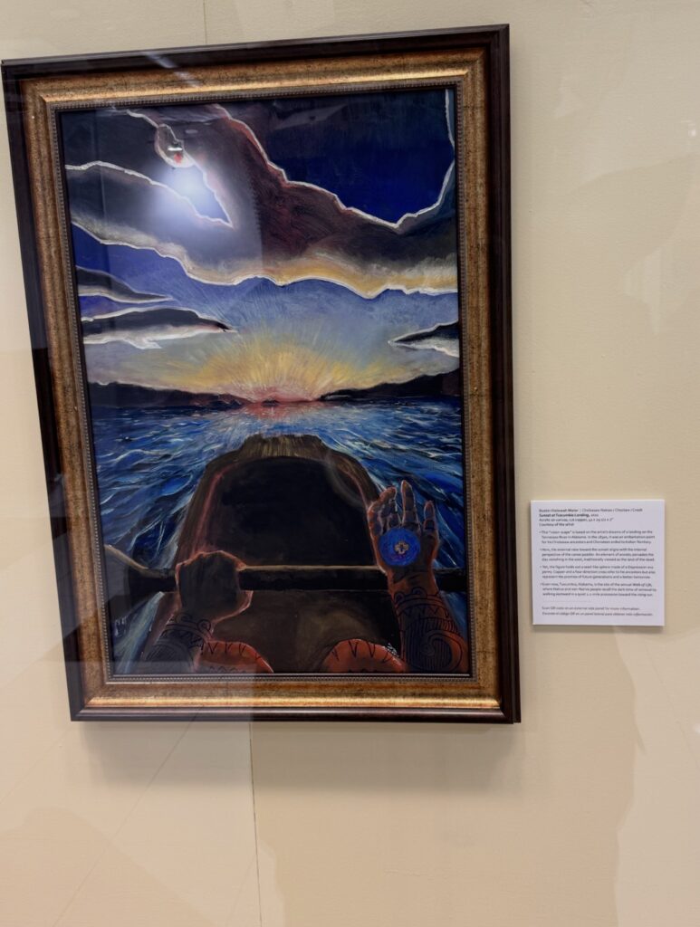Painting of a lone paddler moving across turbulent blue water toward a radiant sunset, based on Chickasaw artist Dustin Illetewah Mater’s vision of Tuscumbia Landing.